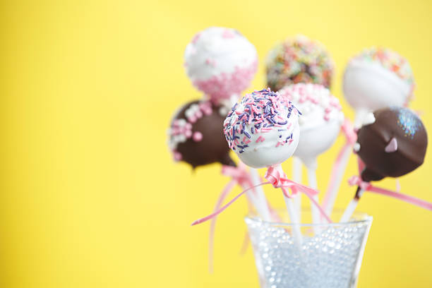 istock Brownie Cakepops Standing up over Yellow 488910007