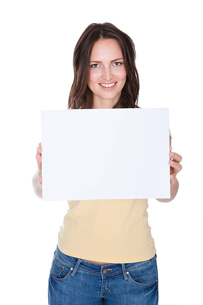 istock Smiling Woman Holding Placard 488910397