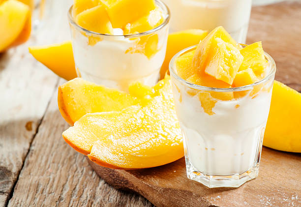 istock Homemade yogurt with fresh mango slices 488910498