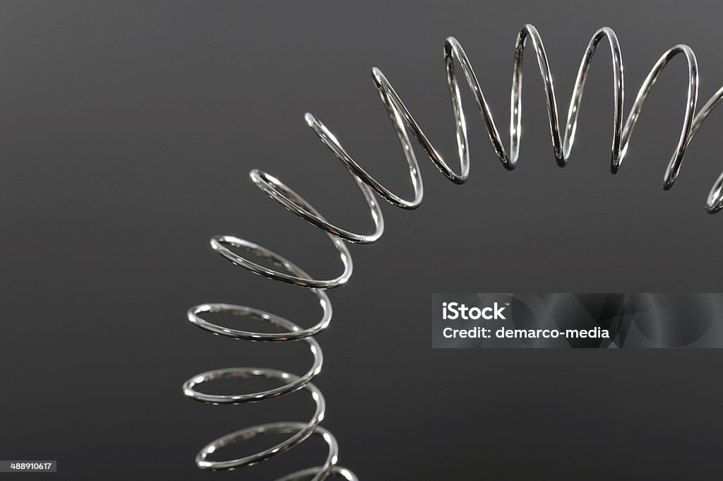 helix in chrome helix in chrome arcuate on black background Flexibility Stock Photo
