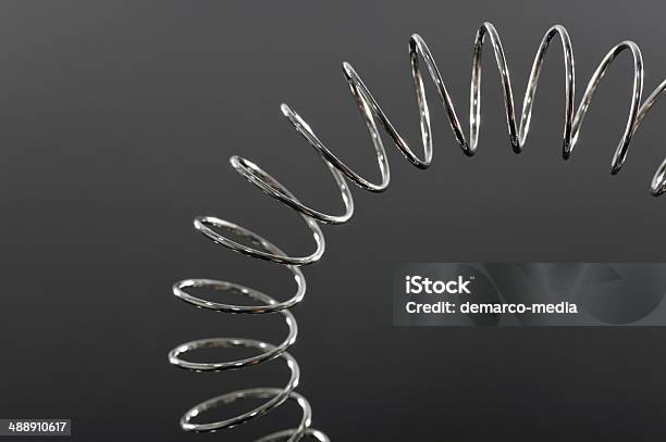 Helix In Chrome Stock Photo - Download Image Now - Flexibility, Coiled Spring, Metal