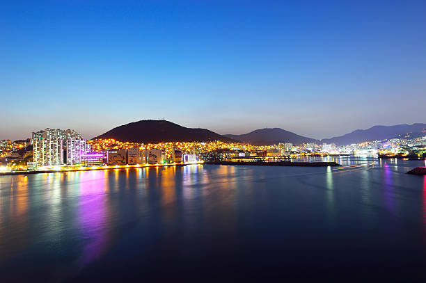 skyline at night with Seo-gu district in Busan, South Korea