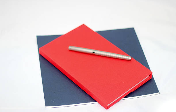 niebieski i czerwony notatnik i szary pióro - three objects personal organizer book pen zdjęcia i obrazy z banku zdjęć