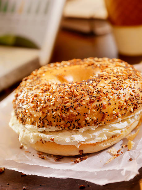istock Toasted Bagel with Cream Cheese at your Desk 488911032