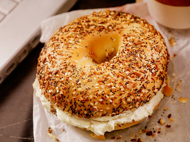 istock Toasted Bagel with Cream Cheese at your Desk 488911178