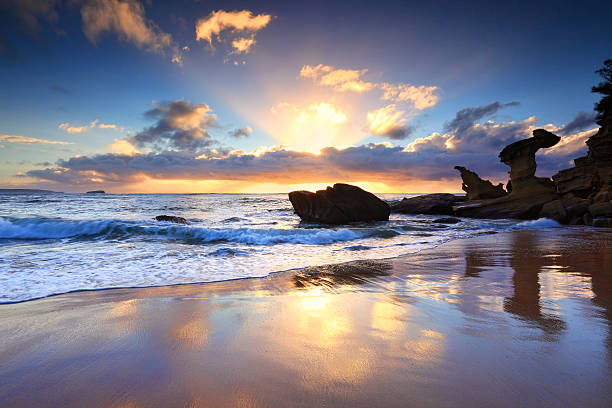 istock Beach sunrise at Noraville NSW Australia 488911331