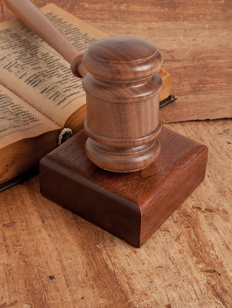 istock Wooden gavel and books 488912239