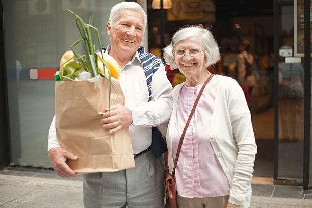 istock Senior couple going from shopping 488913029