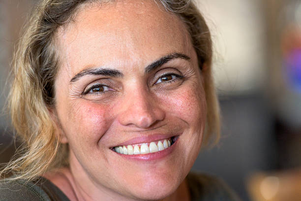 istock Mature hispanic woman smiling 488914302