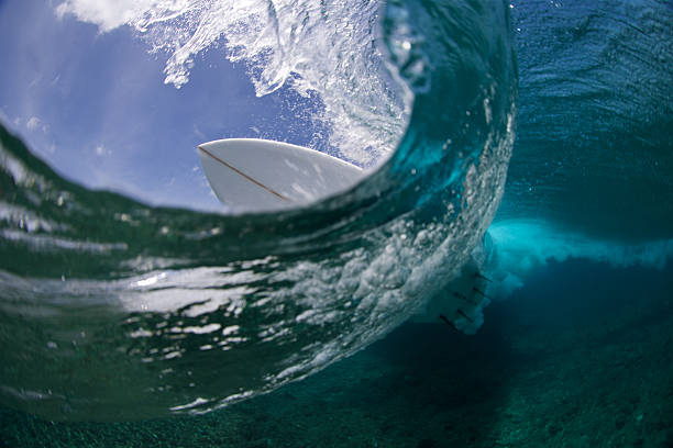 istock Half over half under water perspective of a surfboard turn 488916094