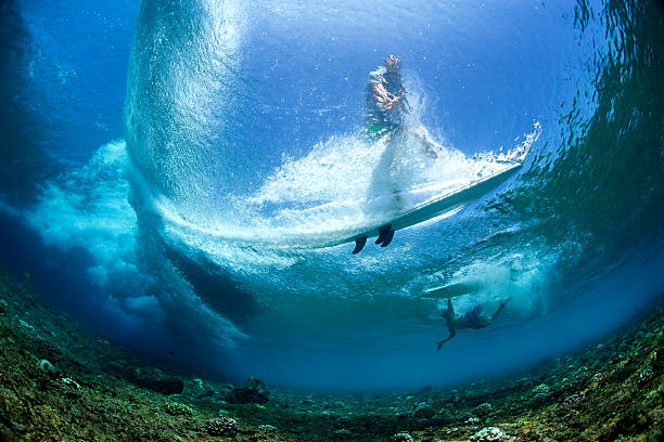 istock Underwater perspective of surfer through the wave 488917102