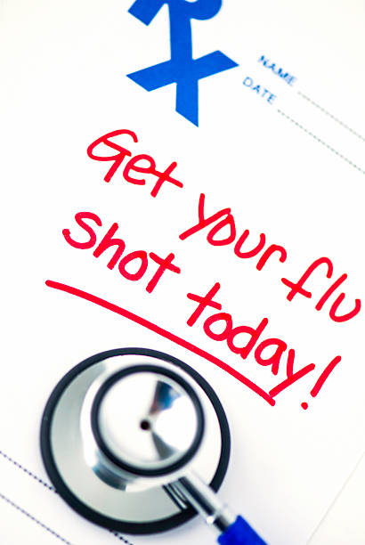istock Flu shot reminder on RX prescription form with stethoscope 488917350