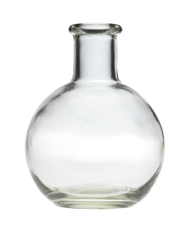 Transparent bottle of perfume with blank red label isolated on white, silver colored lid