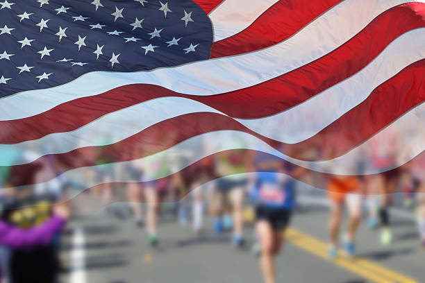 US Flag and Marathon Runners stock photo