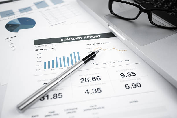 istock Businessman analyzing investment charts with laptop 488940813