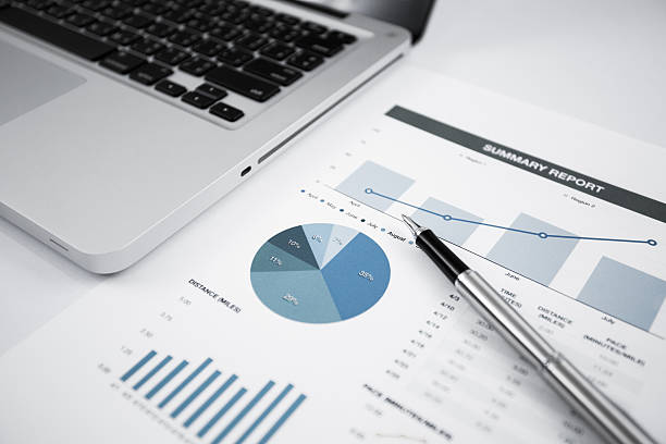 istock Businessman analyzing investment charts with laptop 488940825