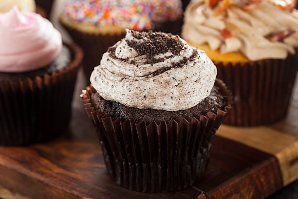 istock Assorted Fancy Gourmet Cupcakes with Frosting 488941023