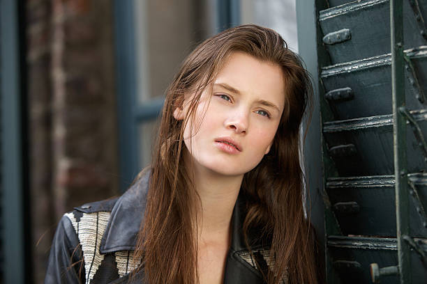 istock Young woman with beautiful face 488941183