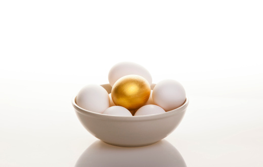 Photo of White Eggs and One Gold Egg