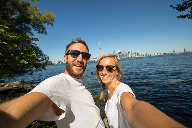 istock Two young adults taking selfie in Toronto 488951930