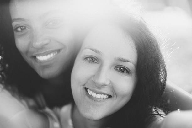 istock Happy girls taking a selfie together 488954132