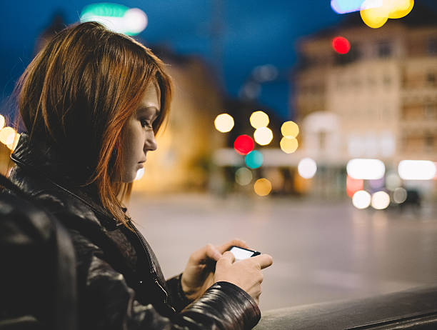 istock Girl reading a text message on smartphone 488957528