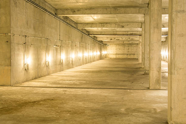 istock Empty industrial garage room interior with concrete.edit temp an 488957780