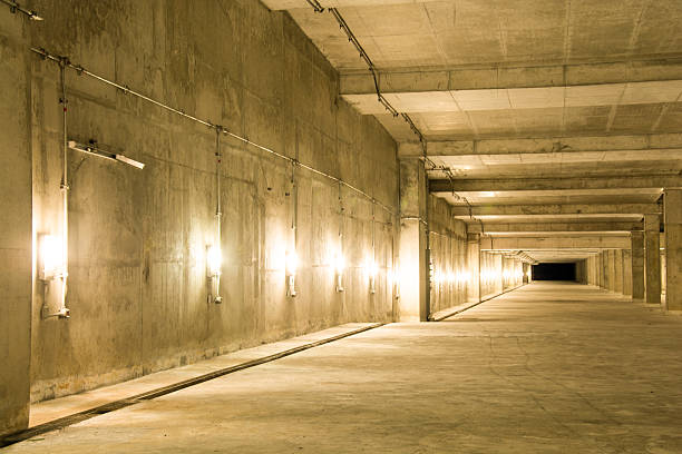 istock Empty industrial garage room interior with concrete.edit temp an 488958054
