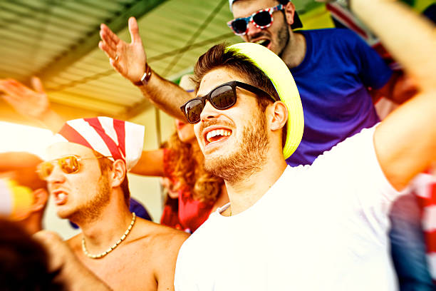 istock Sports fans cheering a game 488959421