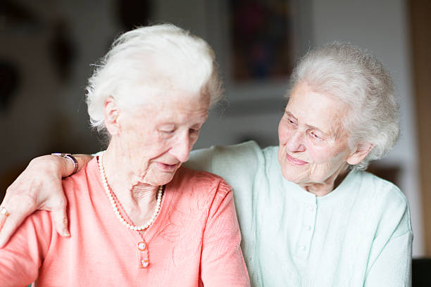istock senior women togetherness consolation 488959635