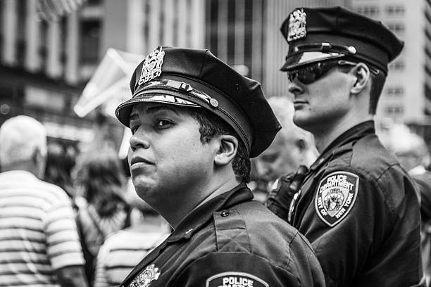 NYPD cops control the crowds at the Peoples Climate March stock photo