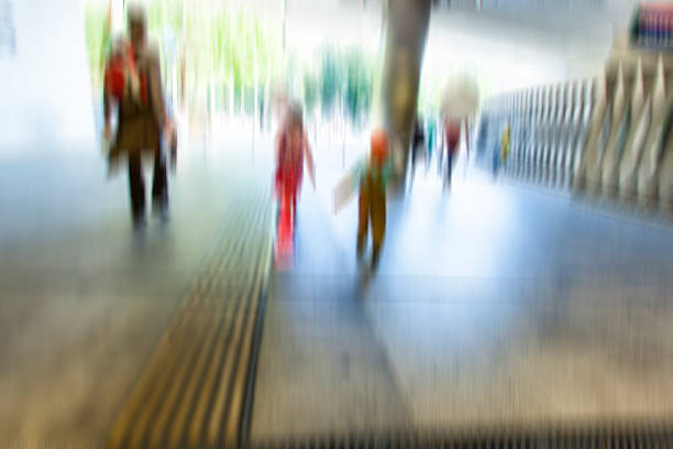 istock people walking on crowded street ,busy street 488960740