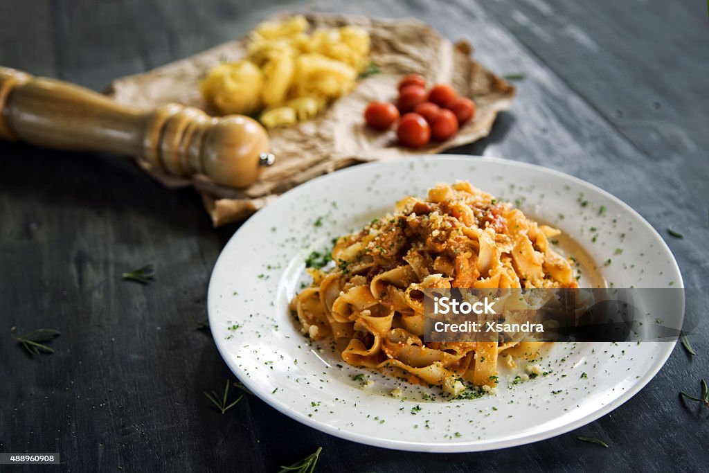 Homemade pasta Homemade fettucine pasta with bolognese sause Pasta Stock Photo