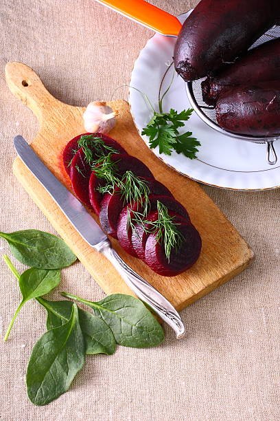 istock Fresh beets and delicious borscht on the table. 488961100