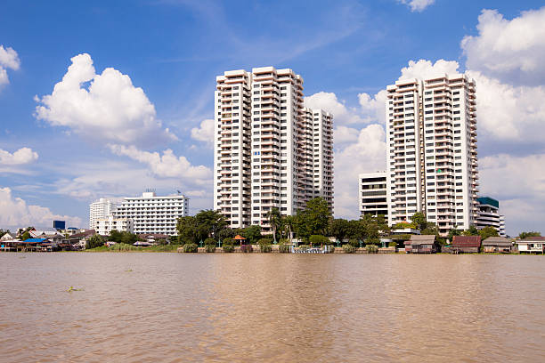 istock modern office building on bule sky at noon day. 488961246