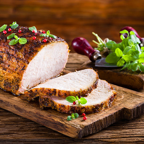 istock Roasted pork loin with cranberry and marjoram 488961402
