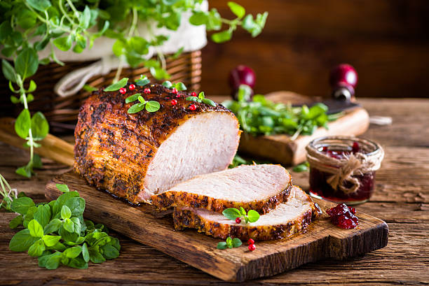 istock Roasted pork loin with cranberry and marjoram 488961432