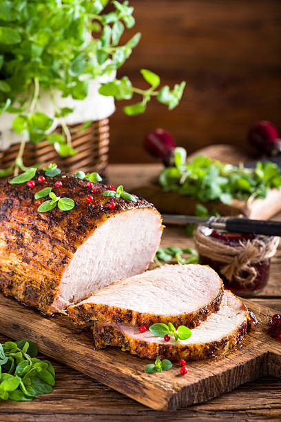 istock Roasted pork loin with cranberry and marjoram 488961460