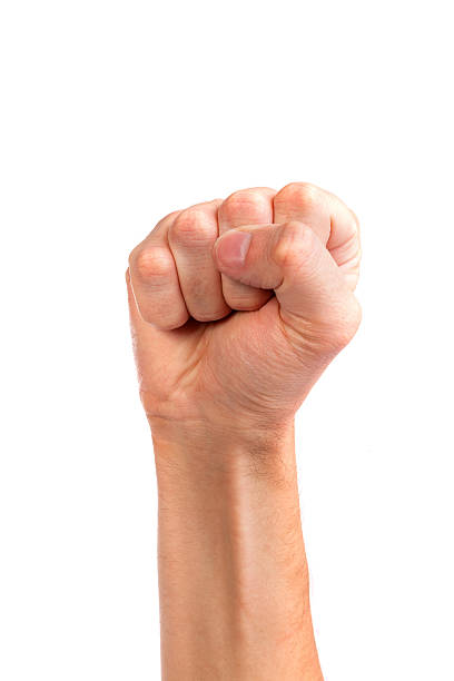 istock Males hand with a clenched fist isolated 488961699