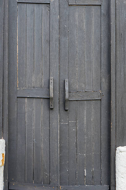 istock Old black wooden door 488961724