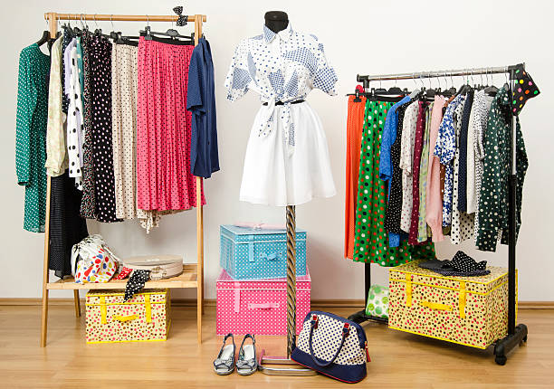 istock Colorful wardrobe with polka dots clothes and accessories. 488961947