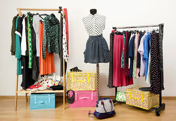 Colorful wardrobe with polka dots clothes and accessories.