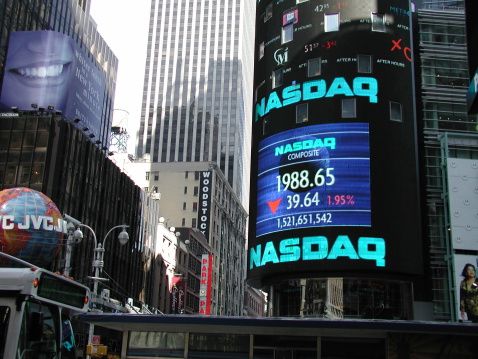 New York City, NY, USA - June 18, 2001: Times Square. NASDAQ Marketsite. Bus moves in left.  Brite smile and JVC ad, left. 