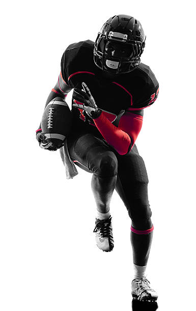 istock american football player runner running silhouette 488963231