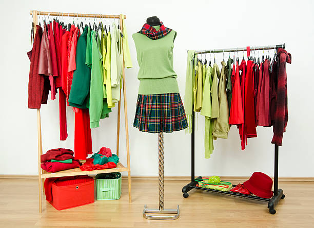 istock Dressing closet with complementary colors red and green clothes. 488963353