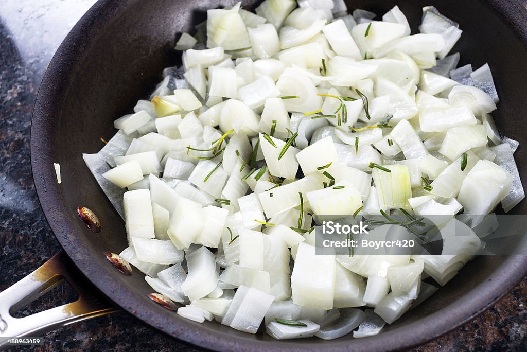 Pan of Sauted Onions Sauted Onions in a frying pan Activity Stock Photo