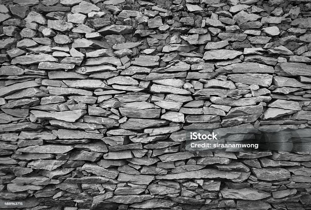 Agrietado real stone superficie de pared de cemento - Foto de stock de Agrietado libre de derechos