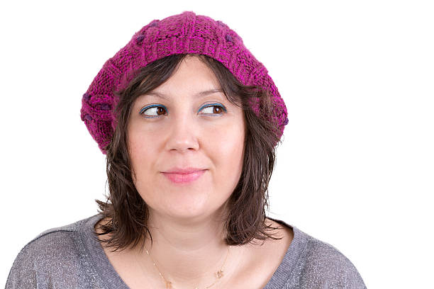 istock Thoughtful woman smiling in anticipation 488964087