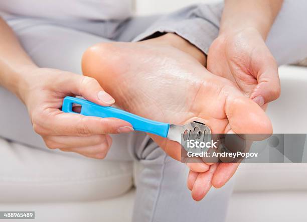 Woman Having Pedicure To Her Legs Stock Photo - Download Image Now - Activity, Adult, Beautician