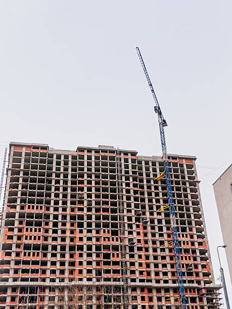istock Tower crane on construction site of modern buildings and skyscrapers 488965893